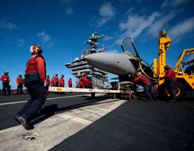 Flickr - Official U.S. Navy Imagery - Sailors assigned to the Crash and Salvage Division practice lifting and moving a decommissioned F-A-18 Hornet