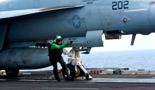 Flickr - Official U.S. Navy Imagery - Sailor clears launch area aboard USS John C. Stennis.