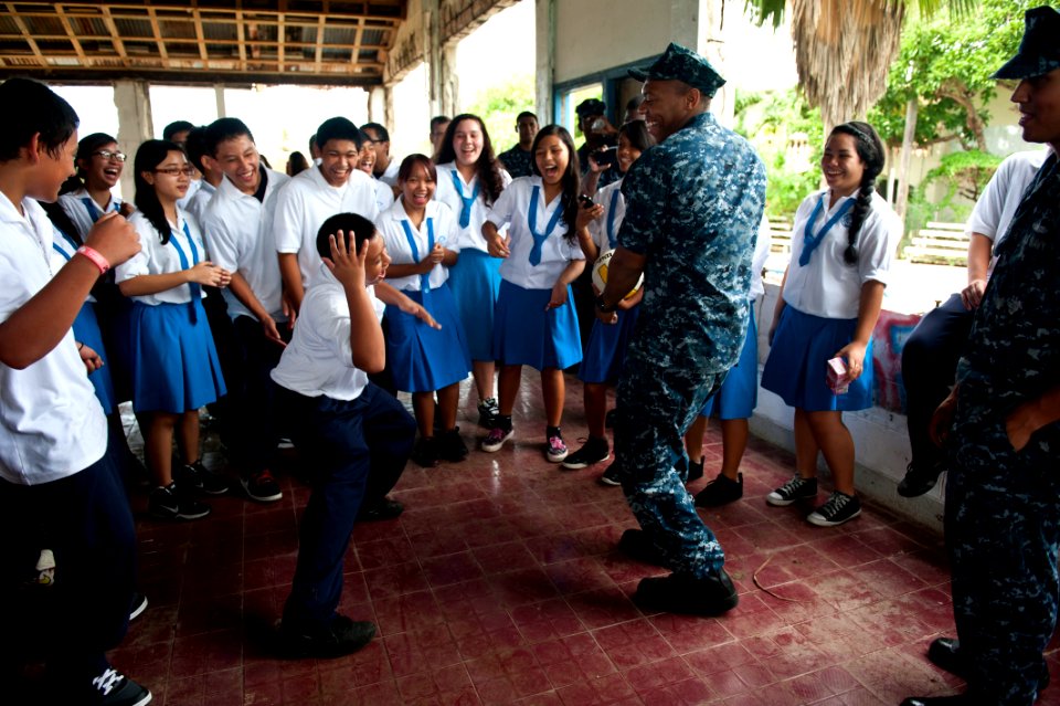 Flickr - Official U.S. Navy Imagery - Sailor dances with students in Saipan.
