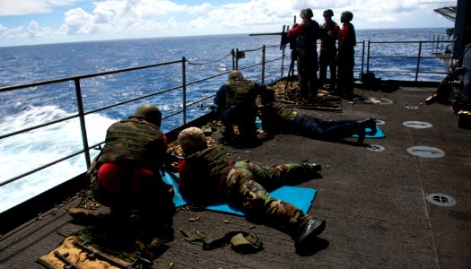 Flickr - Official U.S. Navy Imagery - Sailor fire machine guns at sea.