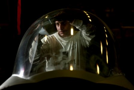 Flickr - Official U.S. Navy Imagery - Sailor installs a pressure seal in the canopy of a Super Hornet.