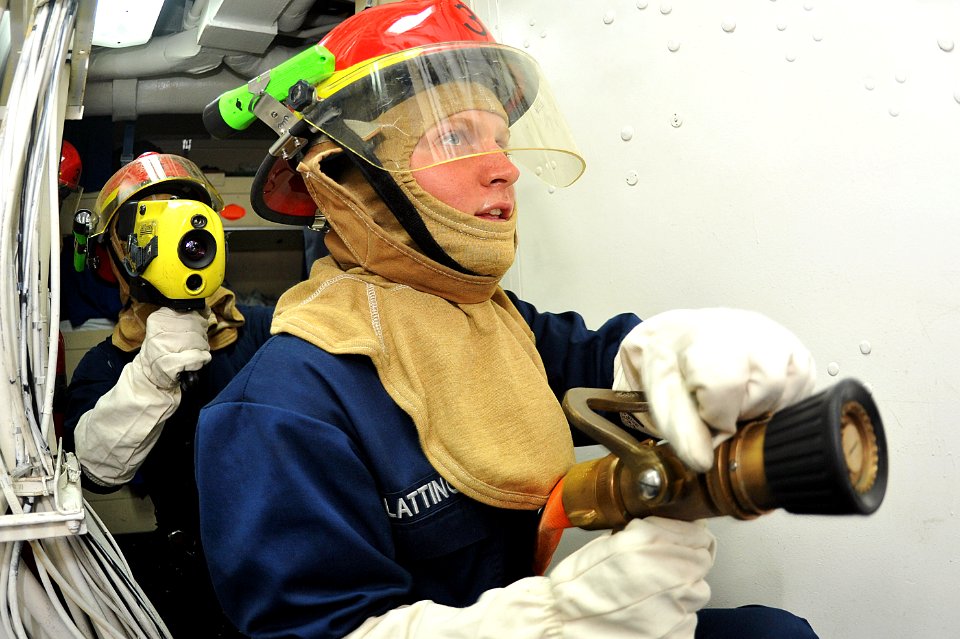 Flickr - Official U.S. Navy Imagery - Sailor fights a simulated fire.