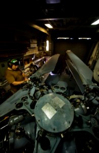 Flickr - Official U.S. Navy Imagery - Sailor performs maintenance on helicopter aboard USS Gridley.