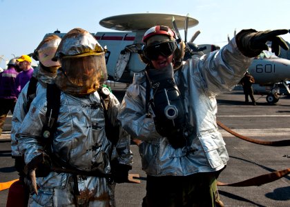 Flickr - Official U.S. Navy Imagery - Sailors clean up after a fire drill.