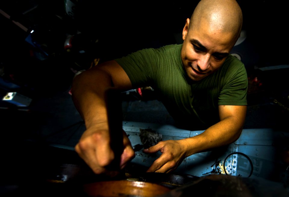 Flickr - Official U.S. Navy Imagery - Sailor performs maintenance on SH-60B Sea Hawk.