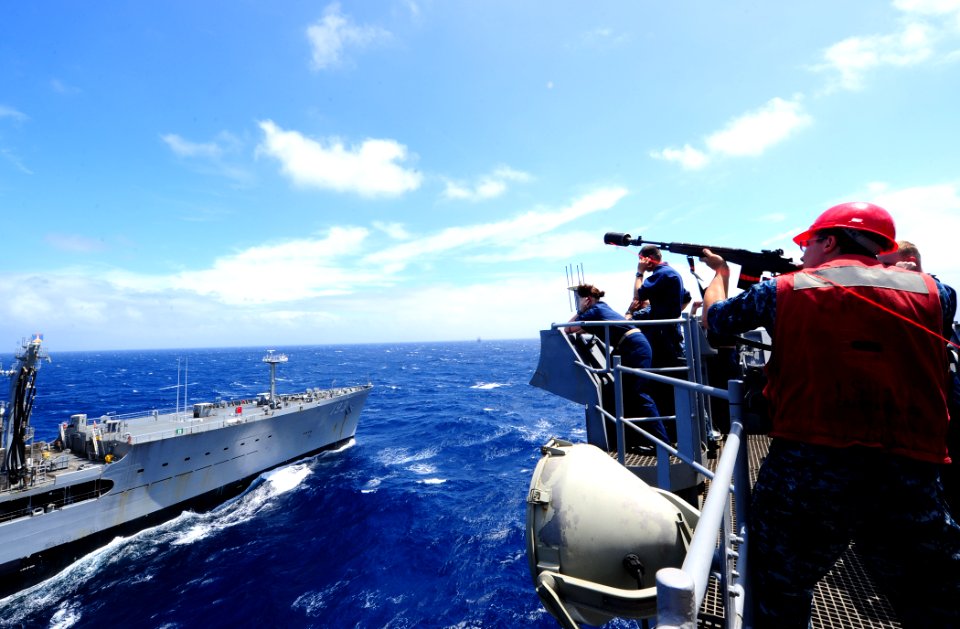 Flickr - Official U.S. Navy Imagery - Sailor prepares to shoot a line.