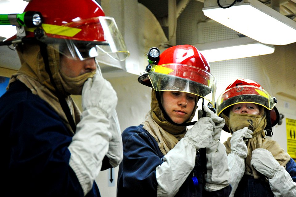 Flickr - Official U.S. Navy Imagery - Sailors don fire fighting gear.