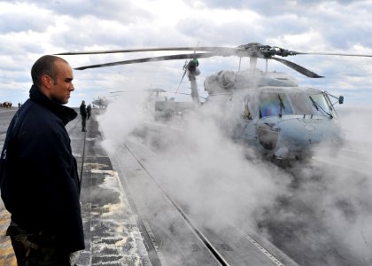 Flickr - Official U.S. Navy Imagery - Sailors aboard USS Enterprise take safety precautions on flight deck.