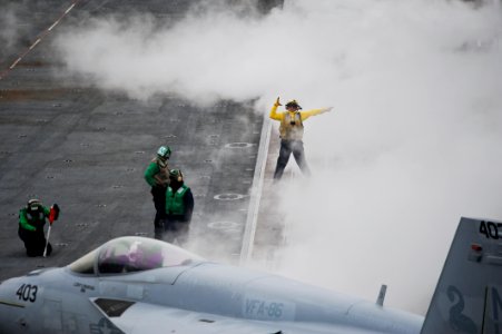 Flickr - Official U.S. Navy Imagery - Sailors aboard the aircraft carrier USS Nimitz (CVN 68) direct an F-18-E Super Hornet.