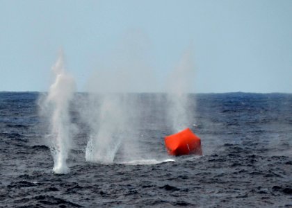 Flickr - Official U.S. Navy Imagery - Sailors fire rounds at a Navy gunnery target.
