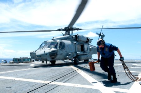 Flickr - Official U.S. Navy Imagery - Sailor with Sea Hawk helicopter.