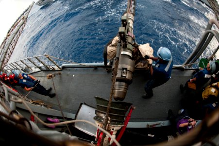 Flickr - Official U.S. Navy Imagery - Sailors adjust a fueiling probe at sea.