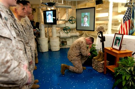 Flickr - Official U.S. Navy Imagery - Sailors and Marines pay respects to Hospital Corpsman 3rd Class Kyler Estrada.