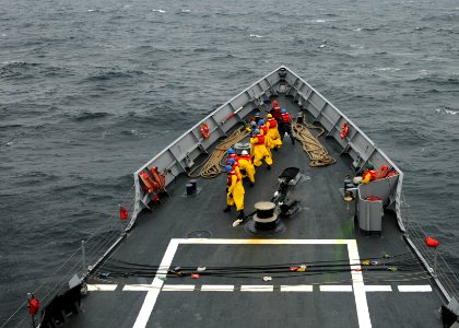 Flickr - Official U.S. Navy Imagery - Sailors handle lines on the foc'sle of USS Underwood during a replenishment at sea.
