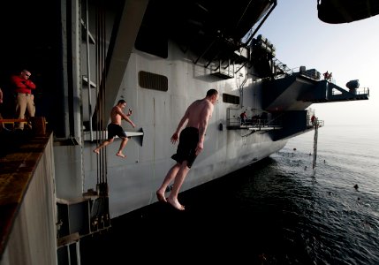 Flickr - Official U.S. Navy Imagery - Sailors jump off aircraft elevator No. 4 during a swim call aboard the Nimitz-class aircraft carrier USS Carl Vinson (CVN 70). (5)