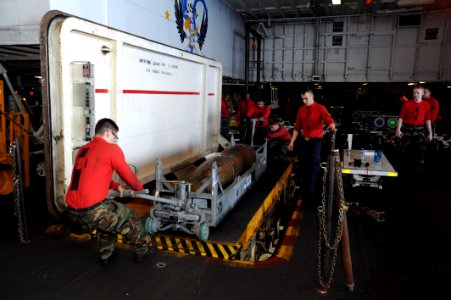 Flickr - Official U.S. Navy Imagery - Sailors move ammunition aboard USS Enterprise.