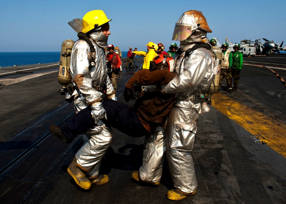 Flickr - Official U.S. Navy Imagery - Sailors carry a simulated casualty during a drill.