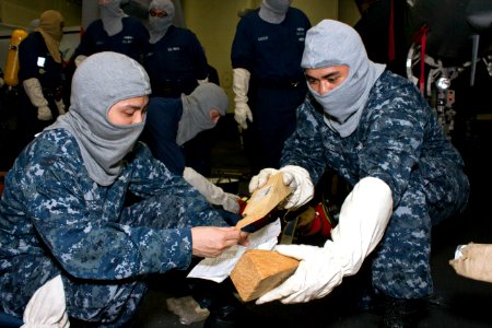Flickr - Official U.S. Navy Imagery - Sailors check their gear during a drill.