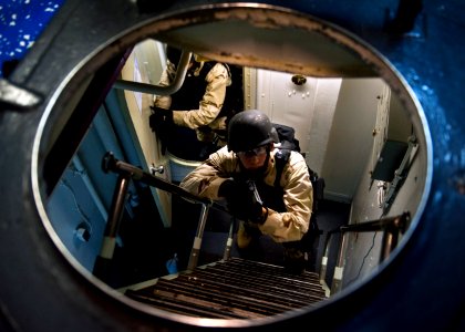 Flickr - Official U.S. Navy Imagery - Sailors clear a ladder well.