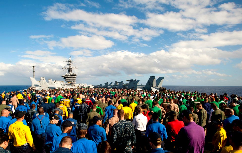 Flickr - Official U.S. Navy Imagery - Sailors check flight deck for debris.