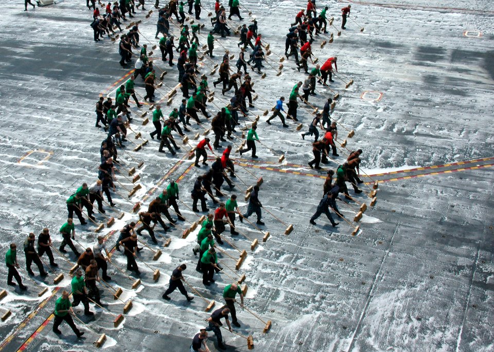 Flickr - Official U.S. Navy Imagery - Sailors clean the flight deck.