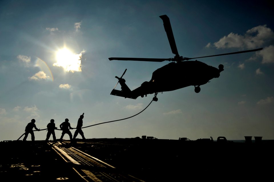 Flickr - Official U.S. Navy Imagery - Sailors conduct an in-flight refueling of an SH-60B.