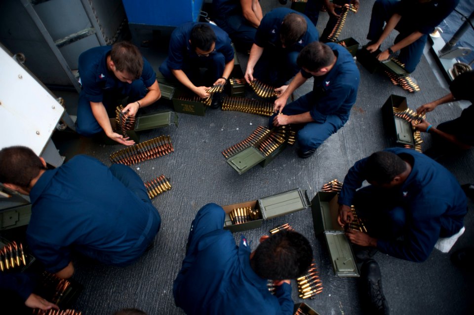 Flickr - Official U.S. Navy Imagery - Sailors fill ammo magazines.