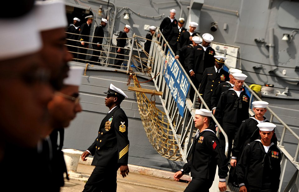 Flickr - Official U.S. Navy Imagery - Sailors disembark USS John L. Hall for the last time.
