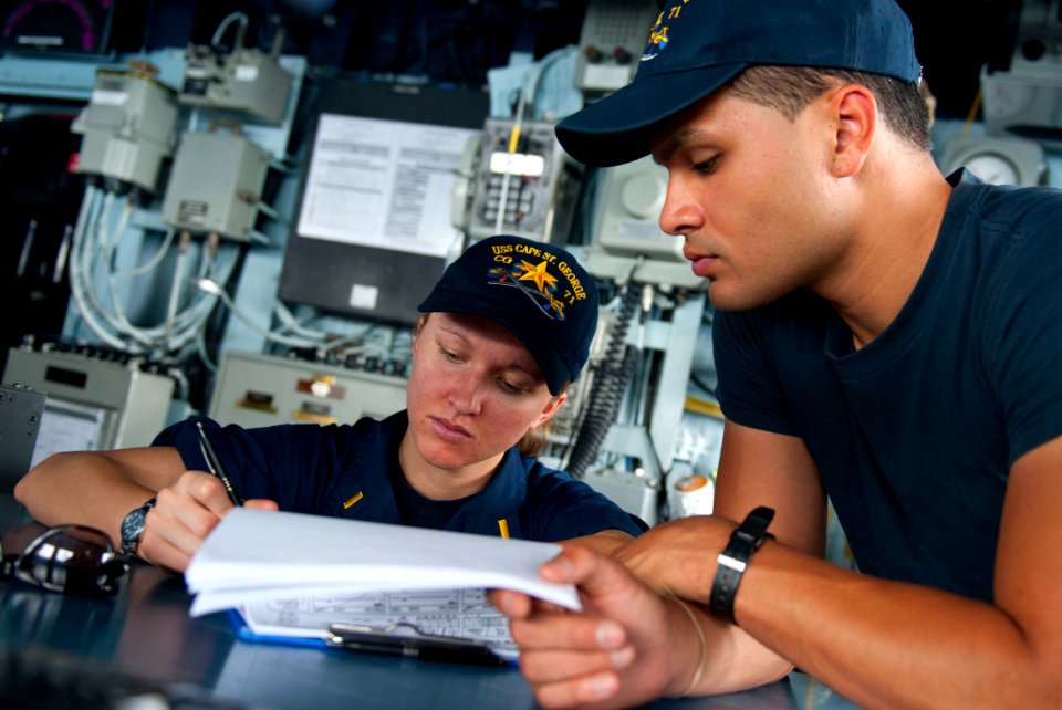 Flickr - Official U.S. Navy Imagery - Sailors fill out a deck log.