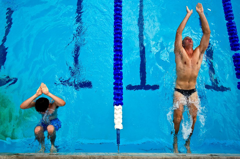 Flickr - Official U.S. Navy Imagery - Sailors from the Republic of Korea and the Royal Australian navy swim the 50-meter backstroke.
