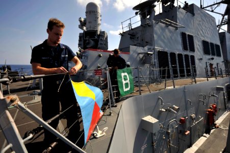Flickr - Official U.S. Navy Imagery - Sailors hang signal flags.