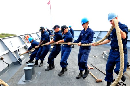 Flickr - Official U.S. Navy Imagery - Sailors heave a mooring line.