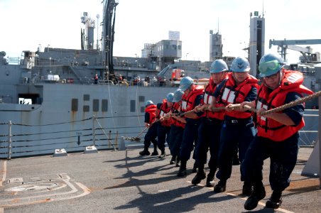 Flickr - Official U.S. Navy Imagery - Sailors handle lines at sea.