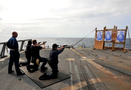 Flickr - Official U.S. Navy Imagery - Sailors qualify with pistols at sea.