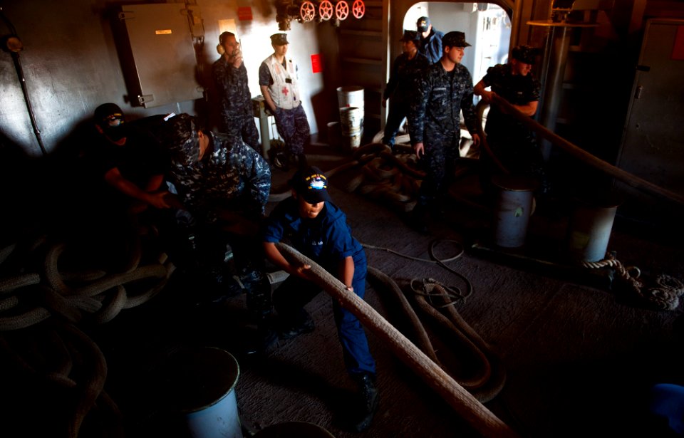 Flickr - Official U.S. Navy Imagery - Sailors heave mooring lines.