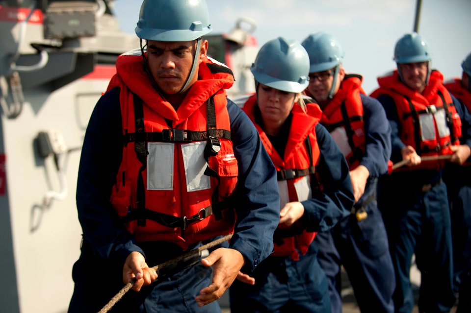 Flickr - Official U.S. Navy Imagery - Sailors heave around the messenger line.