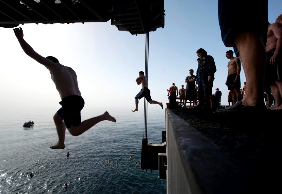 Flickr - Official U.S. Navy Imagery - Sailors jump off aircraft elevator No. 4 during a swim call aboard the Nimitz-class aircraft carrier USS Carl Vinson (CVN 70). (6)