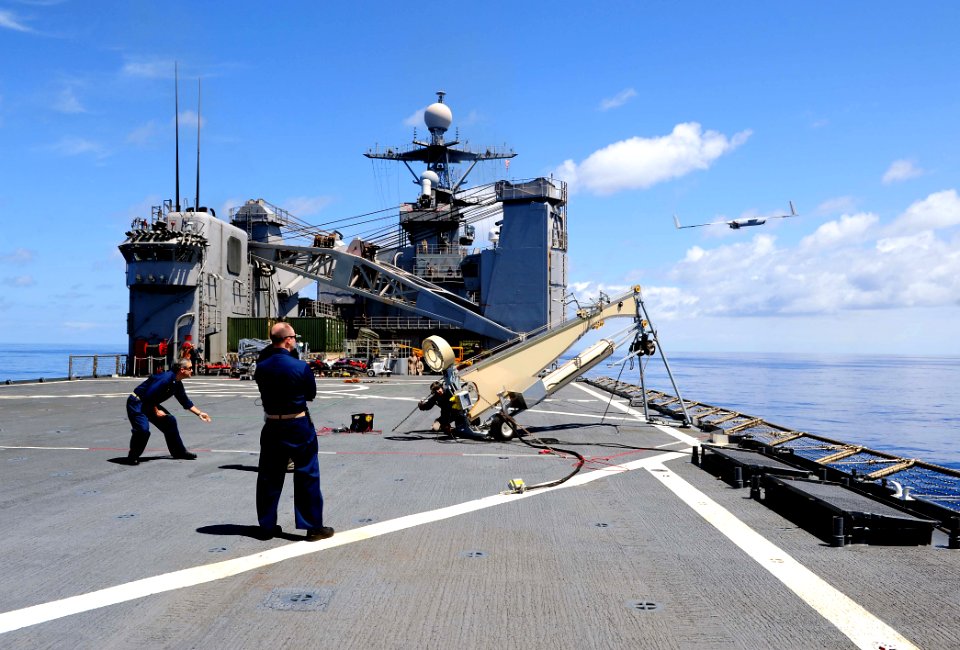 Flickr - Official U.S. Navy Imagery - Sailors launch a Scan Eagle unmanned aerial vehicle.