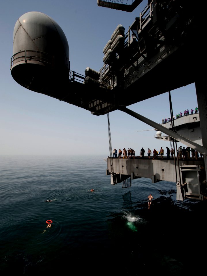 Flickr - Official U.S. Navy Imagery - Sailors jump off aircraft elevator No. 4 during a swim call aboard the Nimitz-class aircraft carrier USS Carl Vinson (CVN 70). (3)