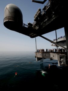 Flickr - Official U.S. Navy Imagery - Sailors jump off aircraft elevator No. 4 during a swim call aboard the Nimitz-class aircraft carrier USS Carl Vinson (CVN 70). (3)