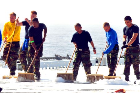 Flickr - Official U.S. Navy Imagery - Sailors scrub the deck.