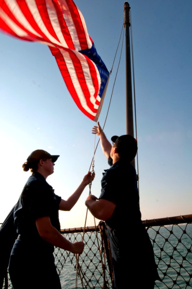Flickr - Official U.S. Navy Imagery - Sailors lower the American flag.
