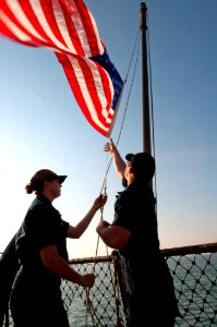 Flickr - Official U.S. Navy Imagery - Sailors lower the American flag.
