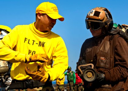 Flickr - Official U.S. Navy Imagery - Sailors learn to handle a fire hose.