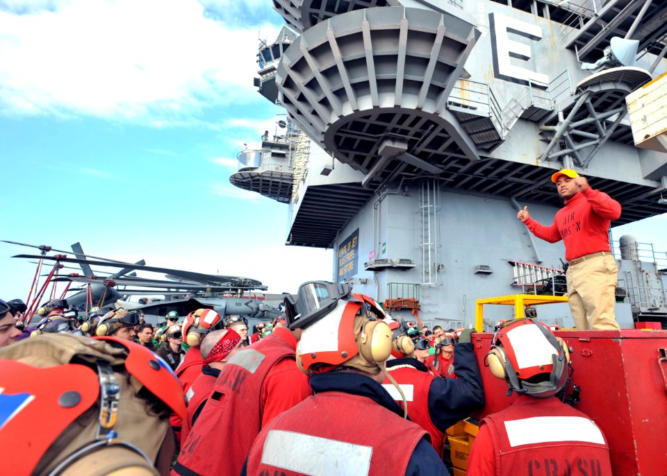 Flickr - Official U.S. Navy Imagery - Sailors listen to brief before training exercise.