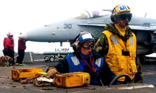Flickr - Official U.S. Navy Imagery - Sailors move an aircraft. photo