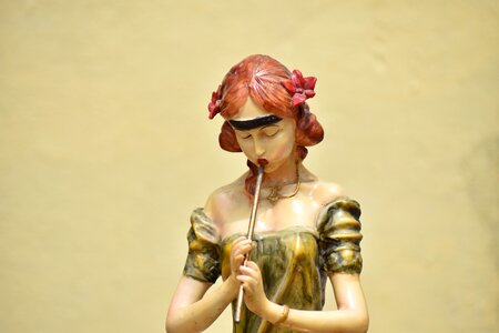 Red hair statue yellow hair
