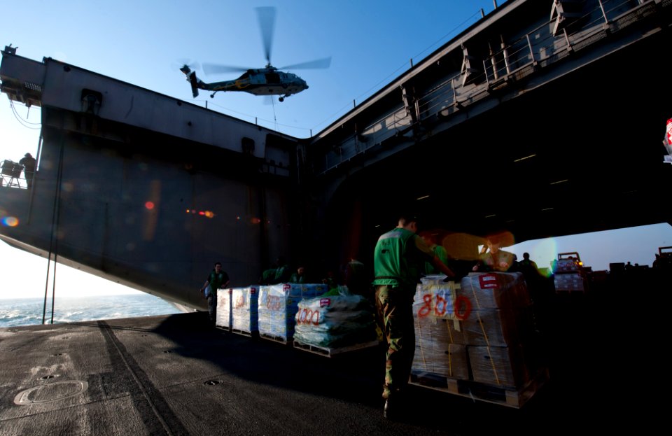 Flickr - Official U.S. Navy Imagery - Sailors move stores aboard USS John C. Stennis.