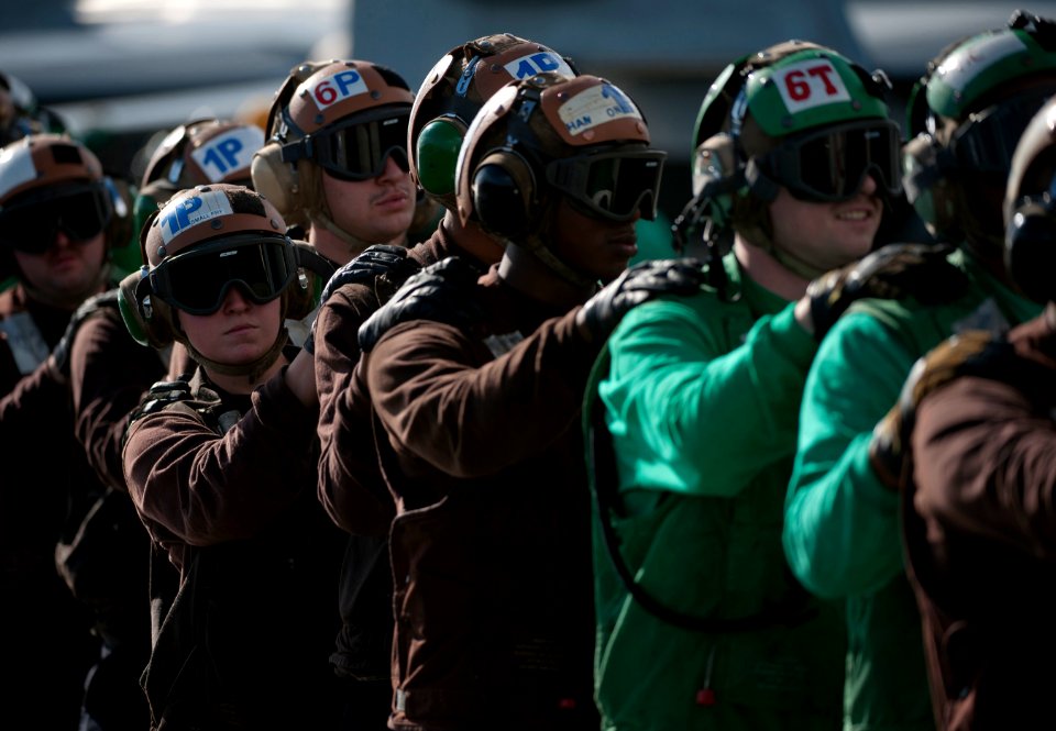 Flickr - Official U.S. Navy Imagery - Sailors stand by to relieve hose team members.