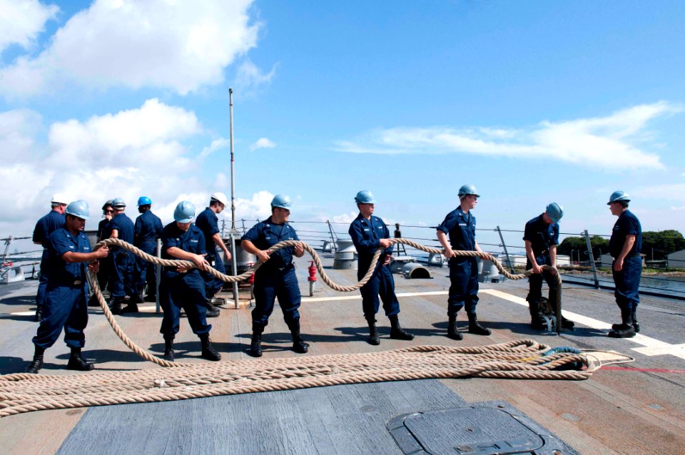 Flickr - Official U.S. Navy Imagery - Sailors move the ship’s lines into storage.